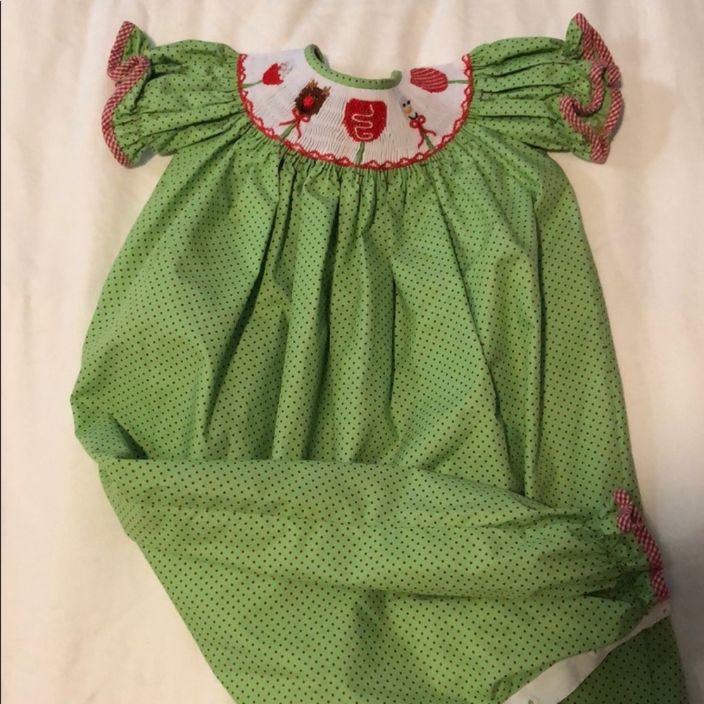 Christmas smocked outfit. Button closure.